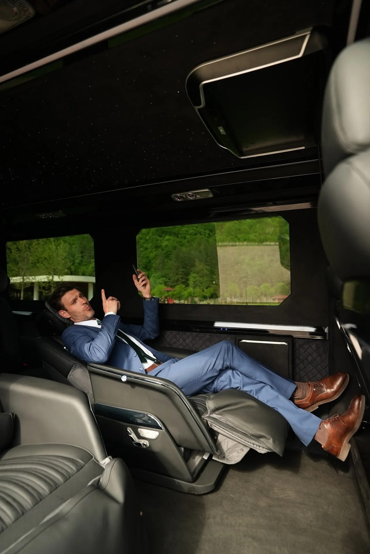 The interior of a luxury cabin with a starlit headliner